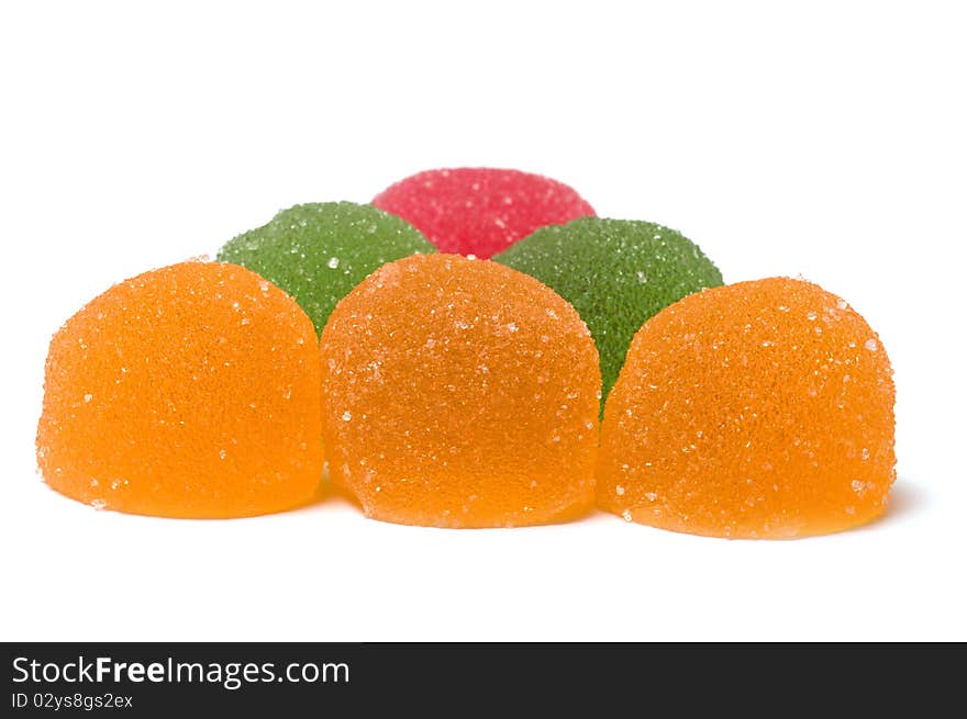 Multi-colored fruit candy on a white background. Multi-colored fruit candy on a white background.