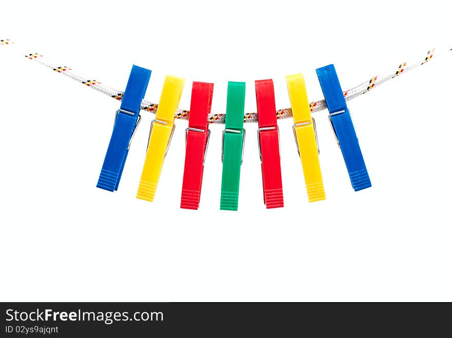 Colorful clothespins on a string