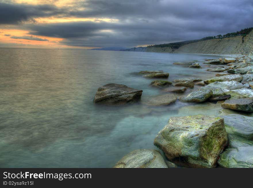 Twilights on a sea-shore. Sunset. Twilights on a sea-shore. Sunset