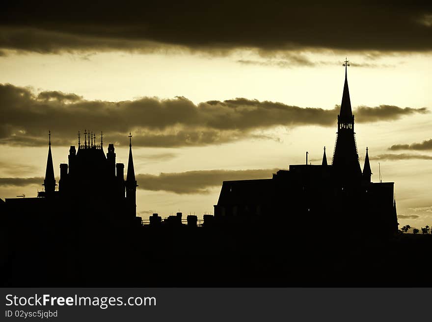 A sunset shot with the skyline of St Pancras Station in London. This is a high contrast image and very suitable for travel guides about London. A sunset shot with the skyline of St Pancras Station in London. This is a high contrast image and very suitable for travel guides about London.