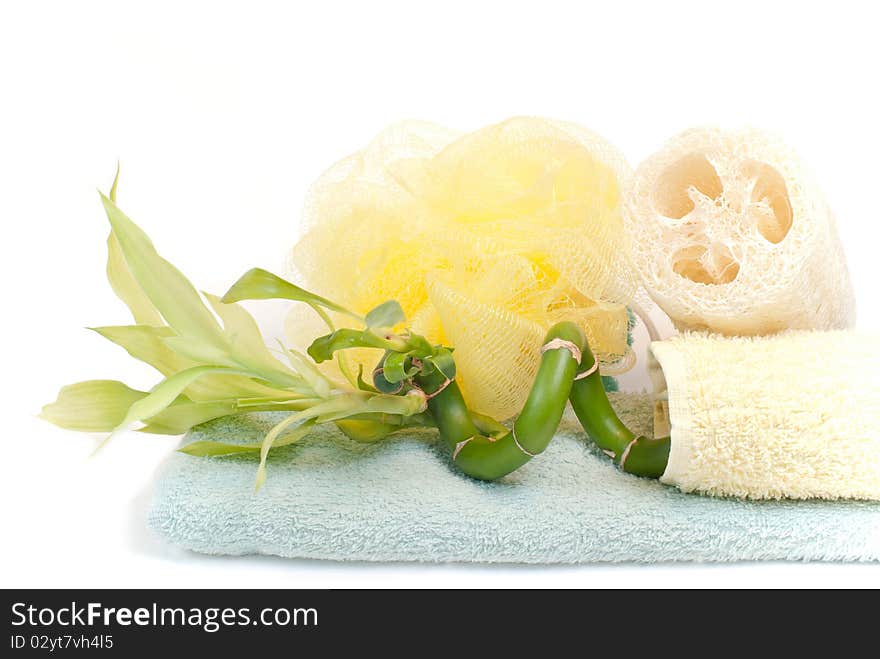 Loofah, bamboo and towels, isolated