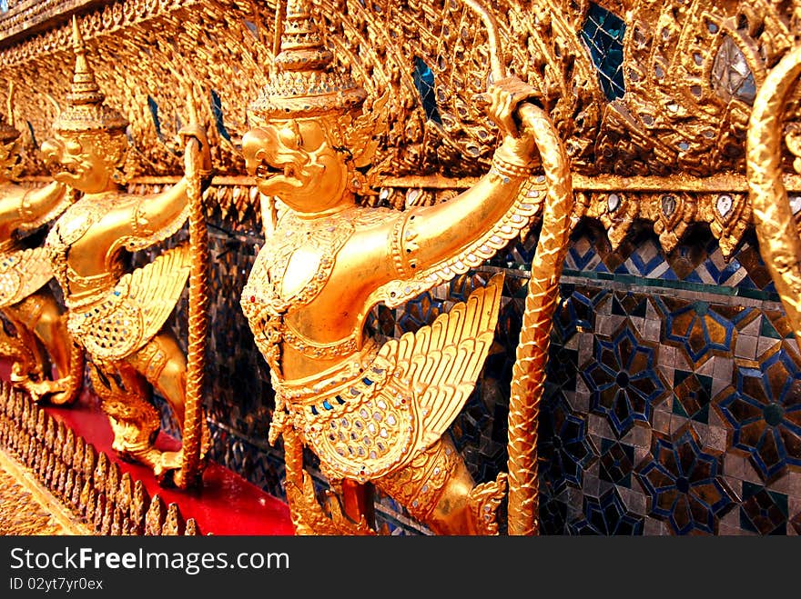 The Golden of Garuda demond guardian around Main Hall Wat Pra Kaew. The Golden of Garuda demond guardian around Main Hall Wat Pra Kaew