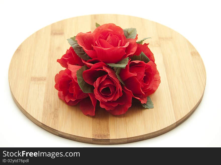 Bunch of roses on wood board