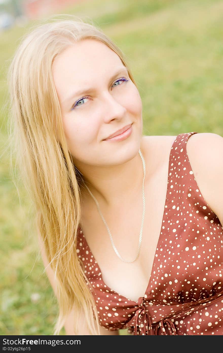 Summer portrait of the beautiful fair-haired girl