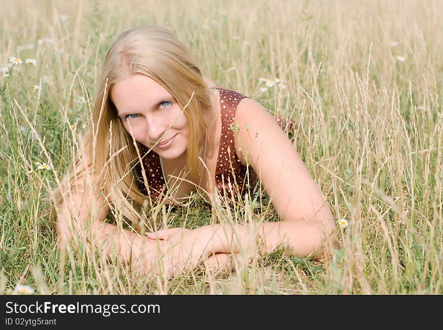 Summer portrait of the beautiful fair-haired girl