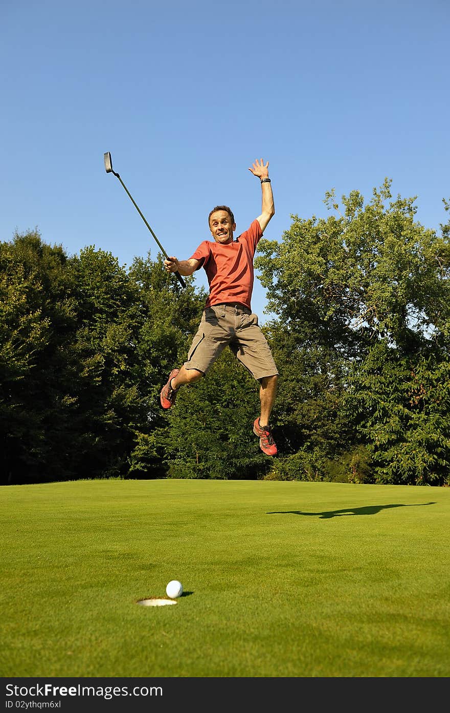 A golfer happy, who'll win. A golfer happy, who'll win