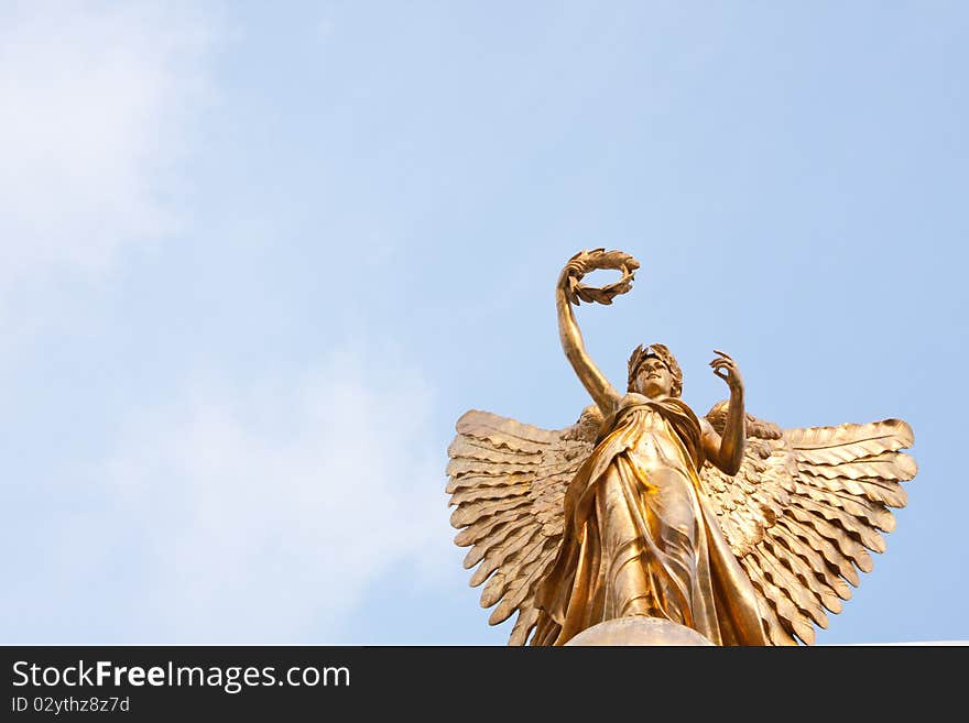 Goddess statue in the sky on a clear sky, beautiful clouds. Goddess statue in the sky on a clear sky, beautiful clouds.