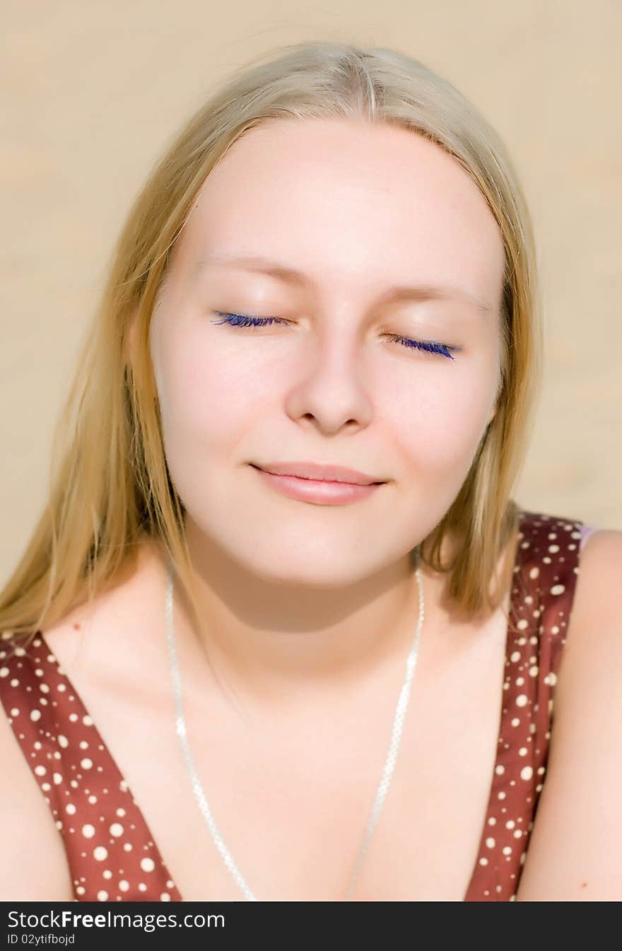 Summer portrait of the beautiful fair-haired girl