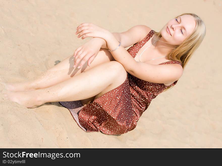 Summer portrait of the beautiful fair-haired girl