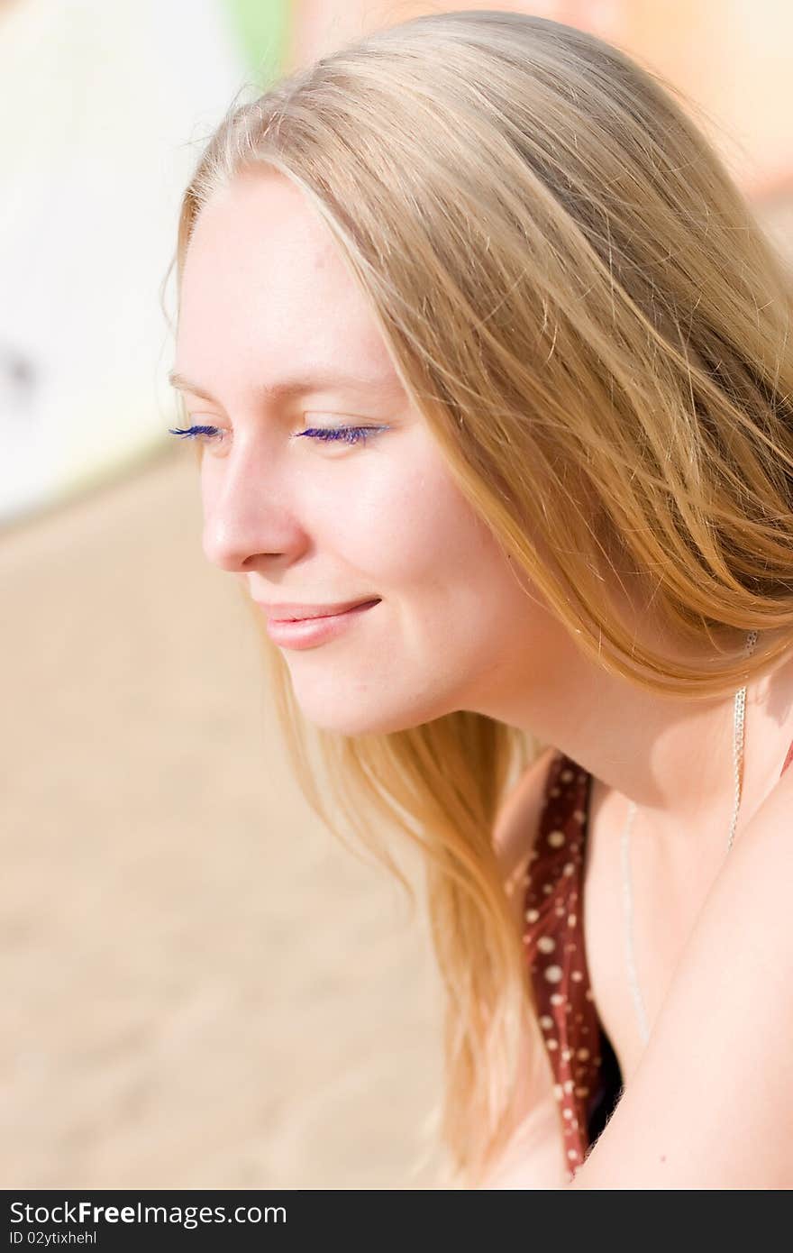 Summer portrait of the beautiful fair-haired girl