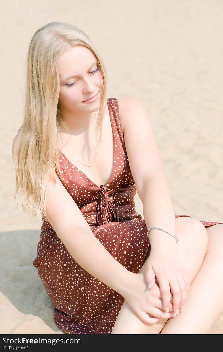 Summer portrait of the beautiful fair-haired girl