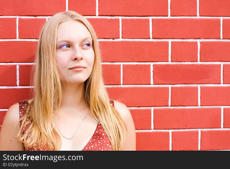 Summer portrait of the beautiful fair-haired girl