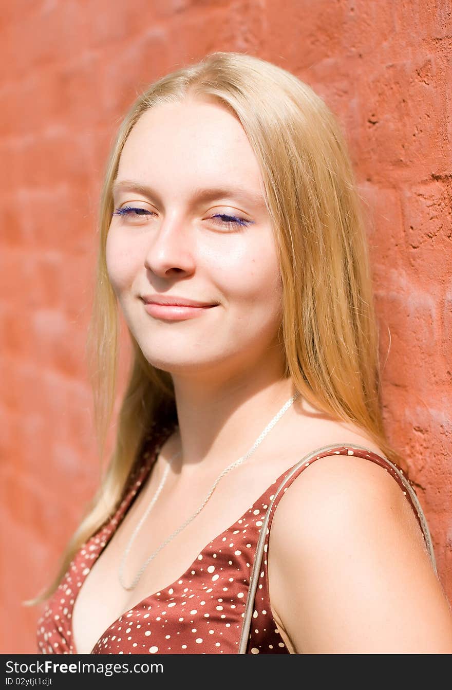 Summer portrait of the beautiful fair-haired girl