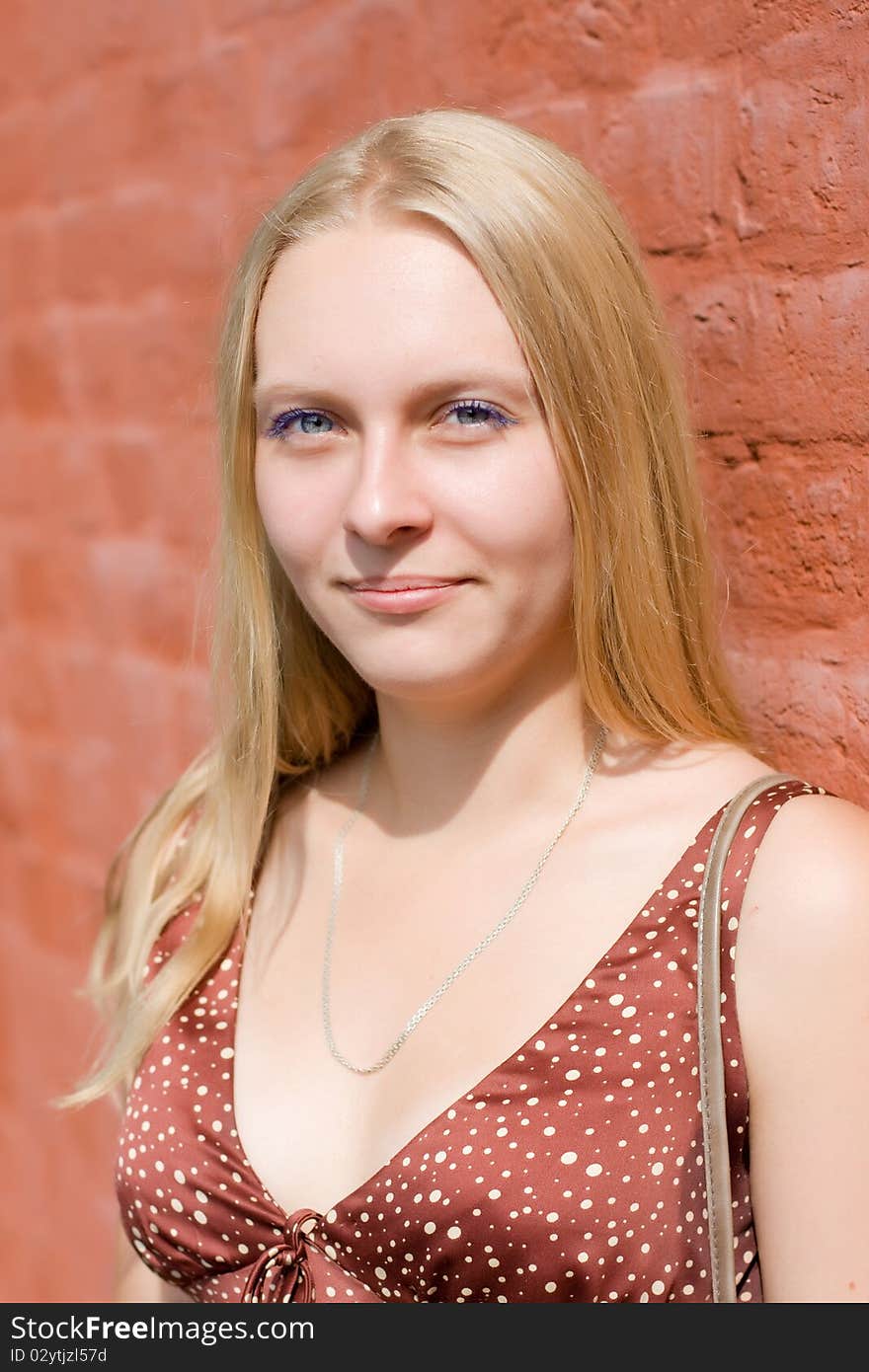 Summer portrait of the beautiful fair-haired girl