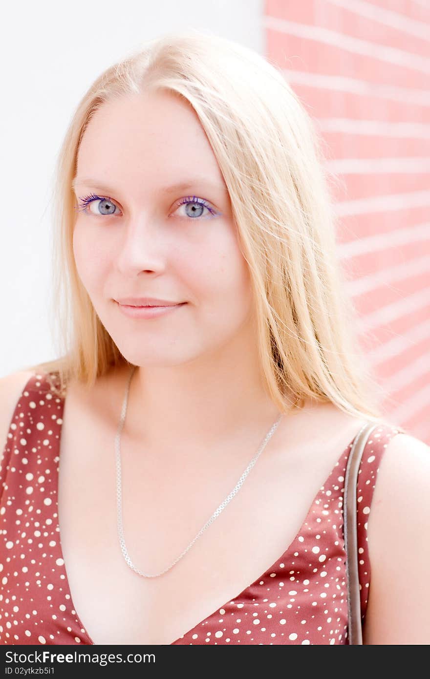 Summer portrait of the beautiful fair-haired girl