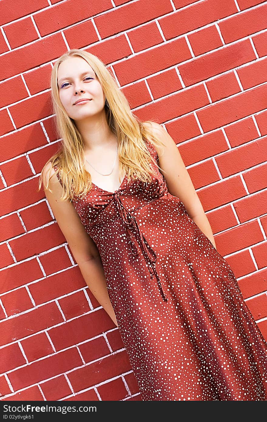 Summer portrait of the beautiful fair-haired girl