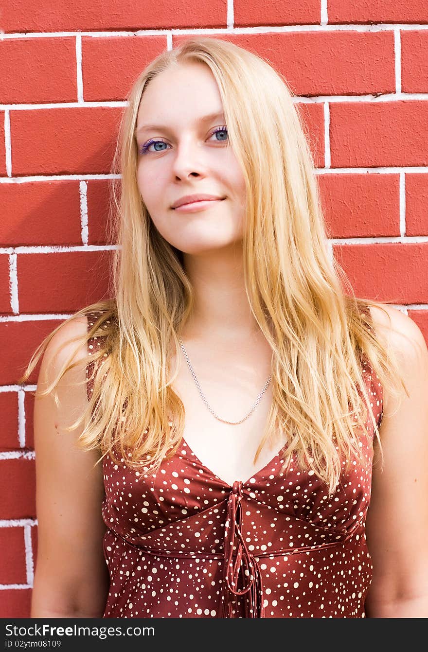 Summer portrait of the beautiful fair-haired girl