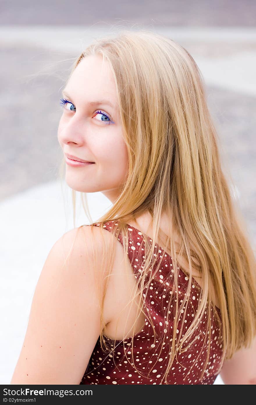 Summer portrait of the beautiful fair-haired girl