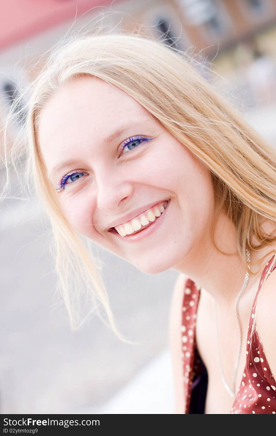 Summer portrait of the beautiful fair-haired girl