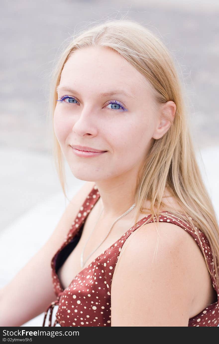 Summer portrait of the beautiful fair-haired girl