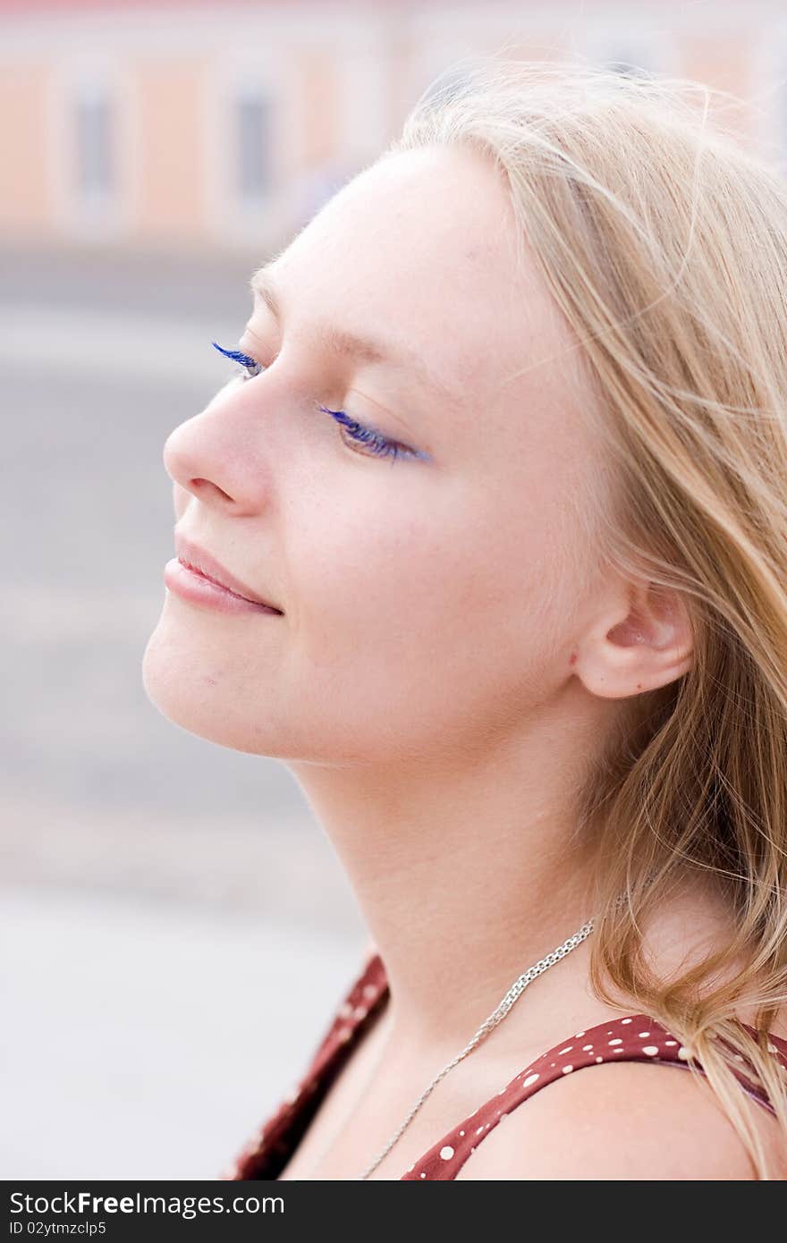 Summer portrait of the beautiful fair-haired girl