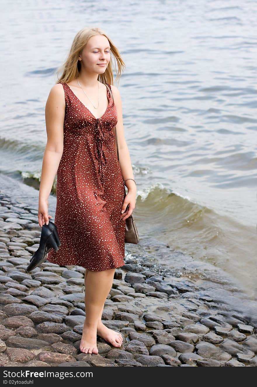 Summer portrait of the beautiful fair-haired girl