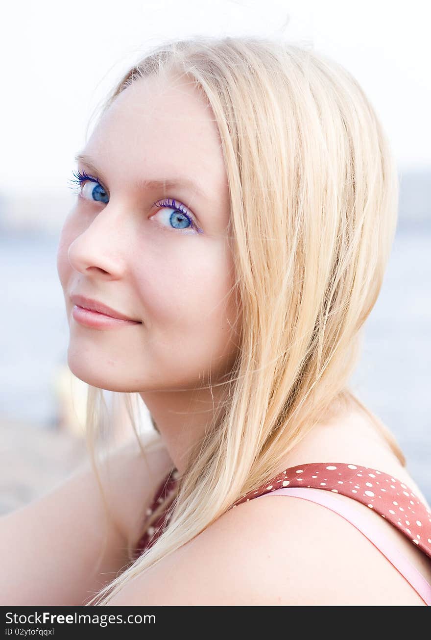 Summer portrait of the beautiful fair-haired girl