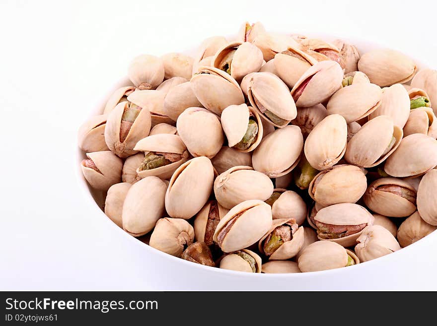 Pistachios isolated on white background