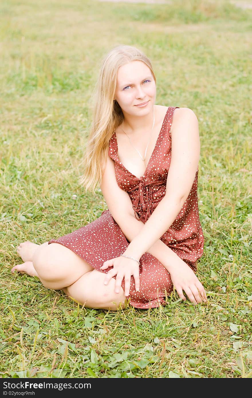 Summer portrait of the beautiful fair-haired girl