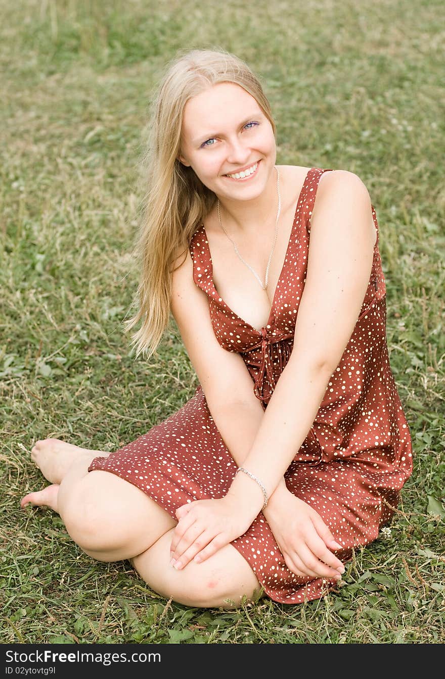 Summer portrait of the beautiful fair-haired girl