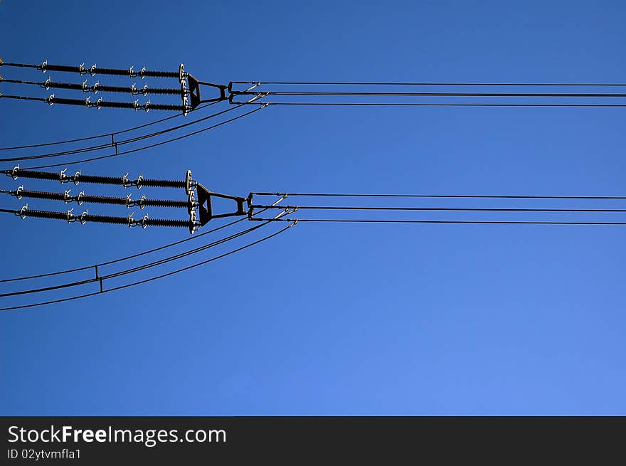 Electric line close-up on a line pole.