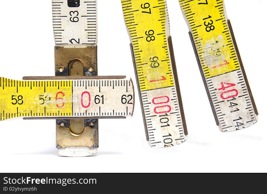 Detail of a yellow and white colored yardstick. Detail of a yellow and white colored yardstick