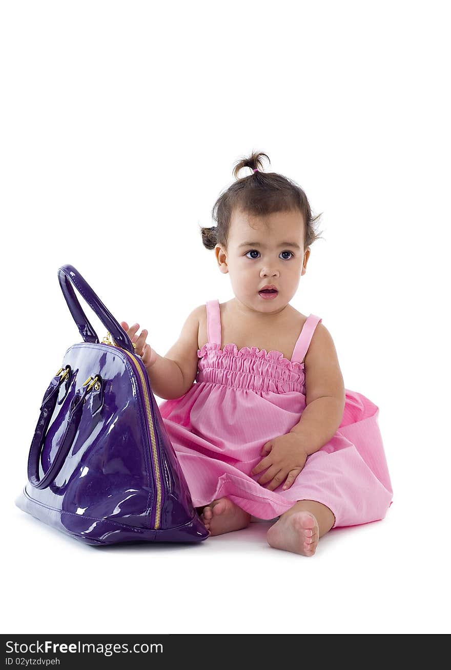 Cute little girl with purse, isolated on white background