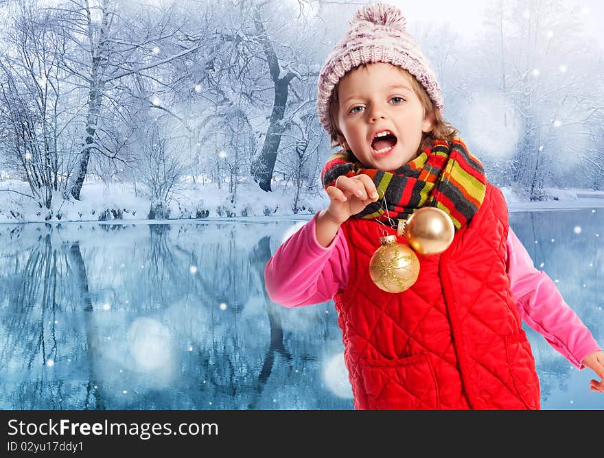 Little girl with christmas balls