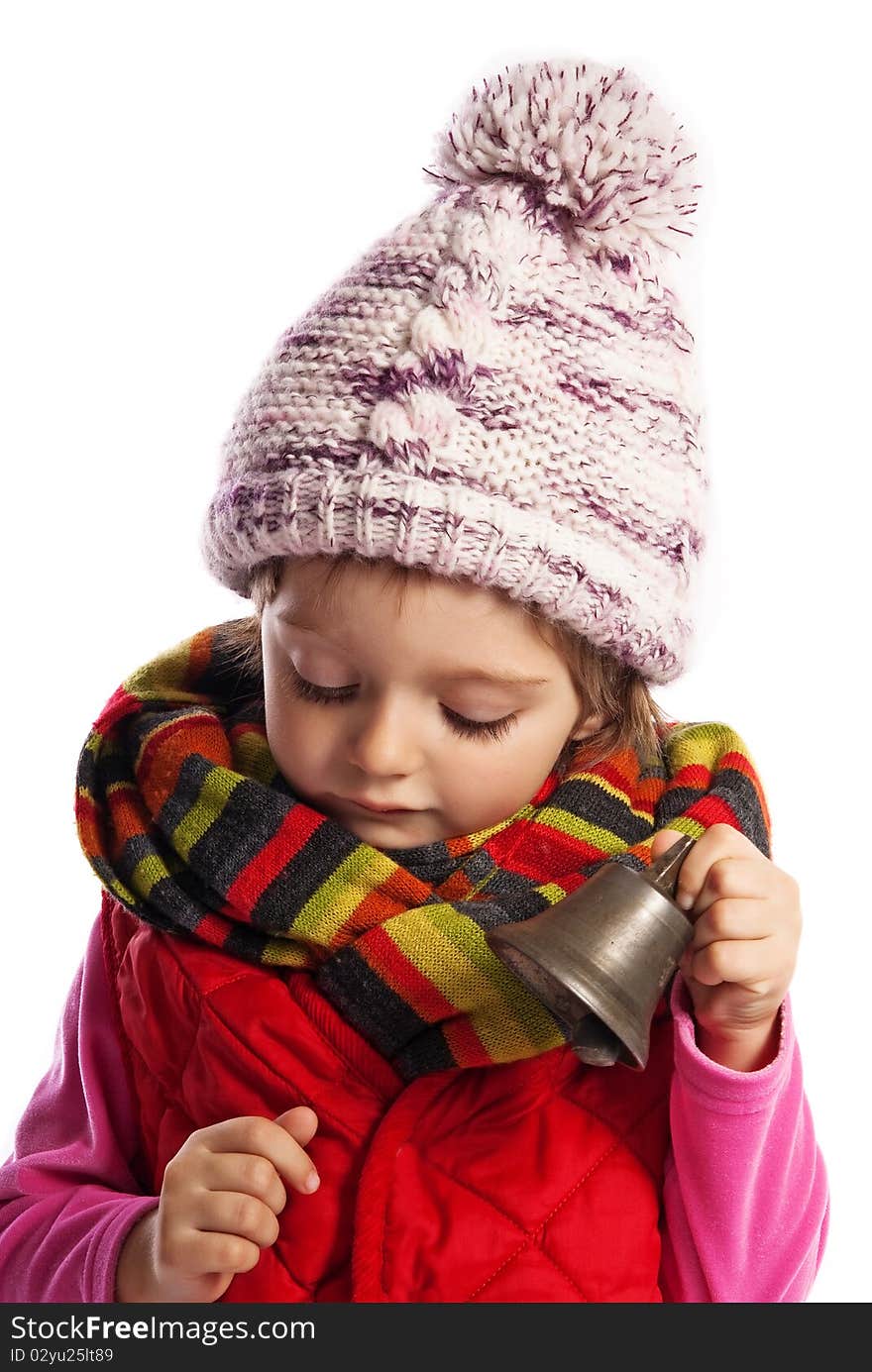 Girl three years old listening christmas bell isolated on white. Girl three years old listening christmas bell isolated on white