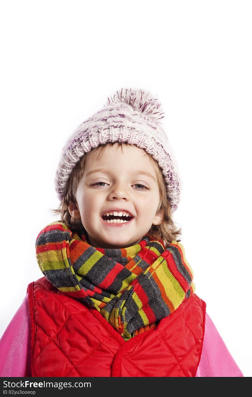 three years old little girl wearing winter clothes isolated