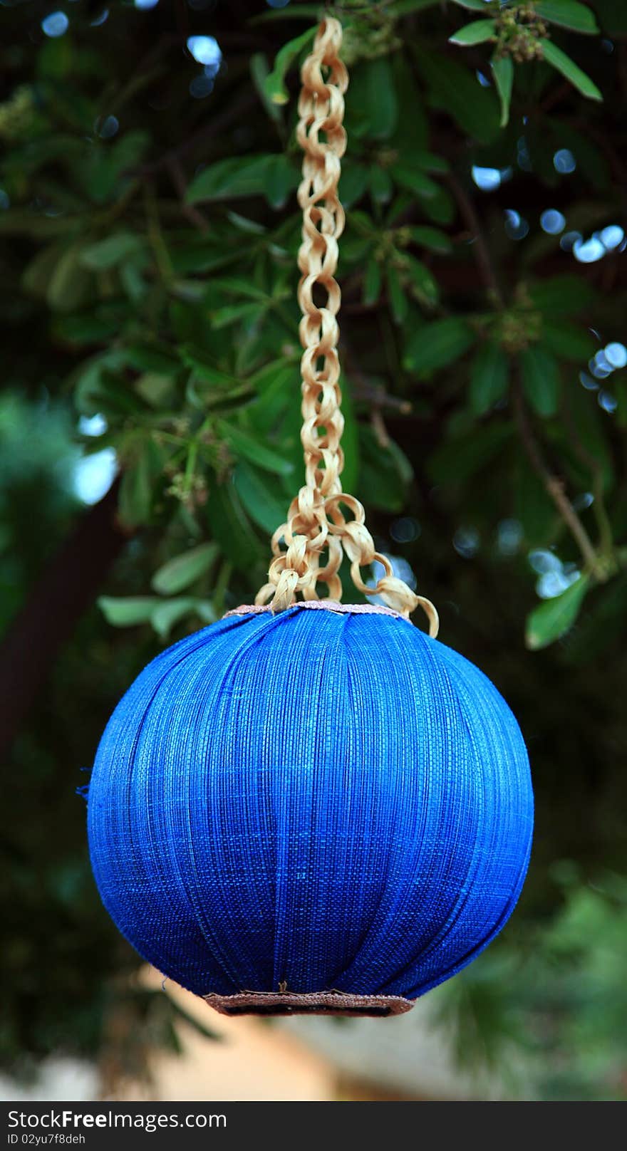 Blue colored solar decoration lamp looking beautiful while hanging on tree. Blue colored solar decoration lamp looking beautiful while hanging on tree.