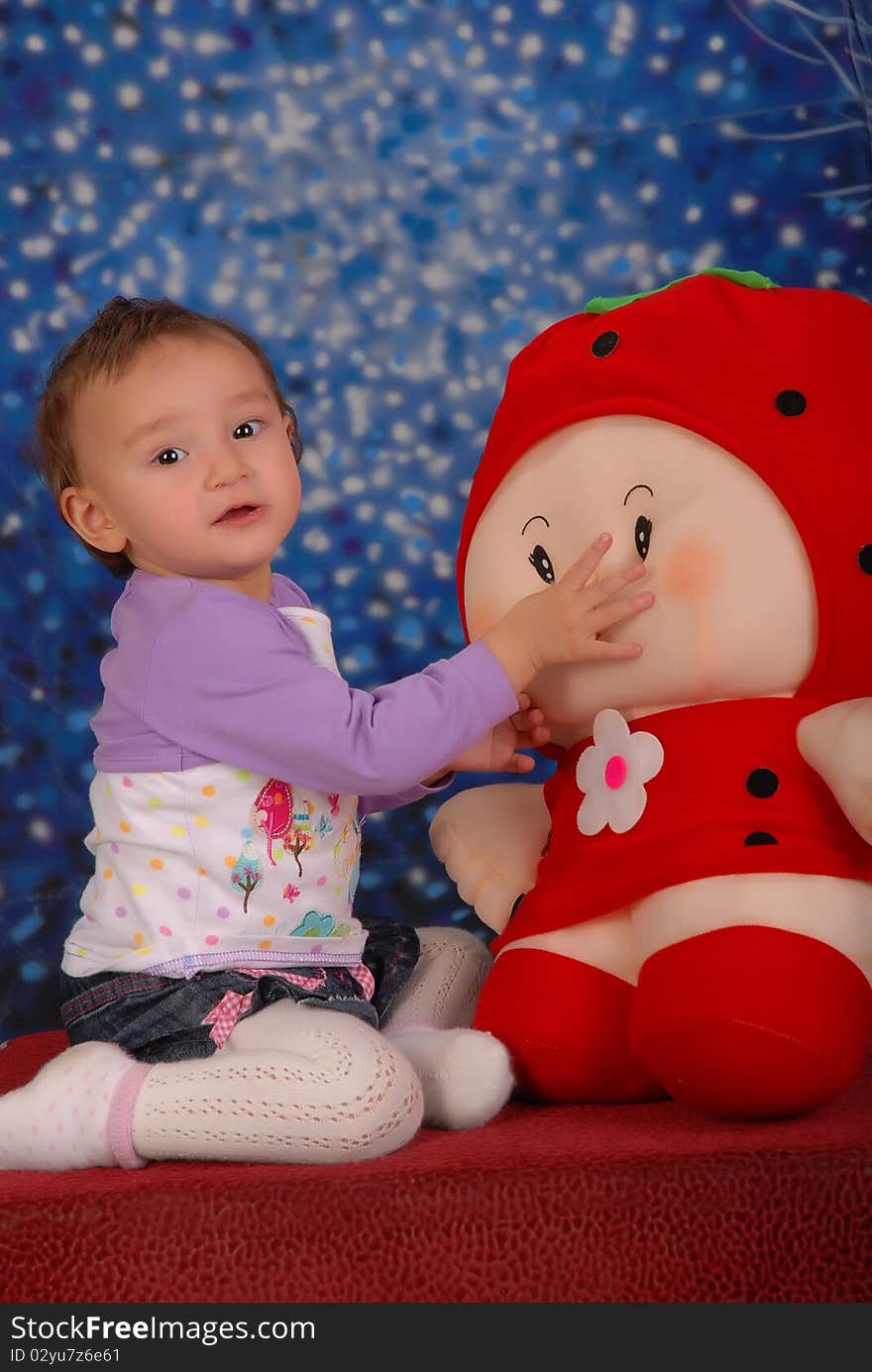 Little girl is playing with toy. Little girl is playing with toy