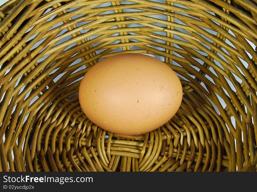 Fresh egg in vintage style basket. Fresh egg in vintage style basket