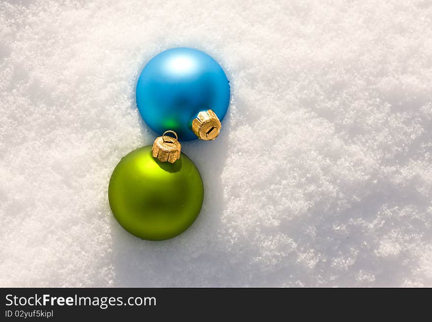 Holiday series: Christmas green ball decoration and snow. Holiday series: Christmas green ball decoration and snow