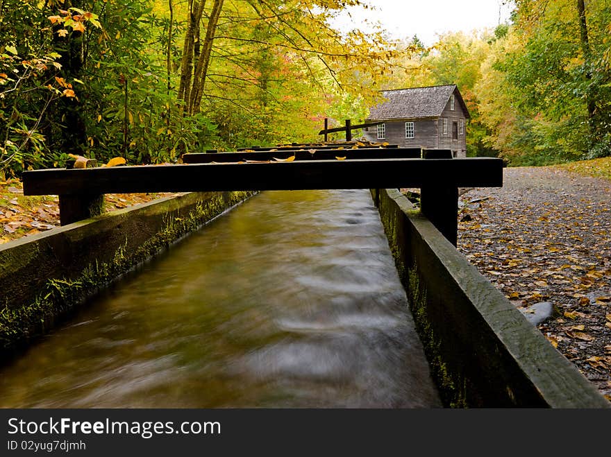 Water flowing in water mill aqueduct at Mingus Mill in Smoky Mountains National Park. Water flowing in water mill aqueduct at Mingus Mill in Smoky Mountains National Park