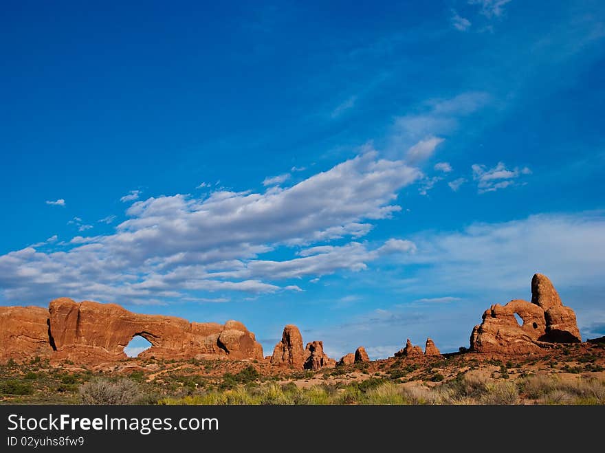 Picturesque clouds over Windows section of Arches National Park near Moab, Utah. Picturesque clouds over Windows section of Arches National Park near Moab, Utah