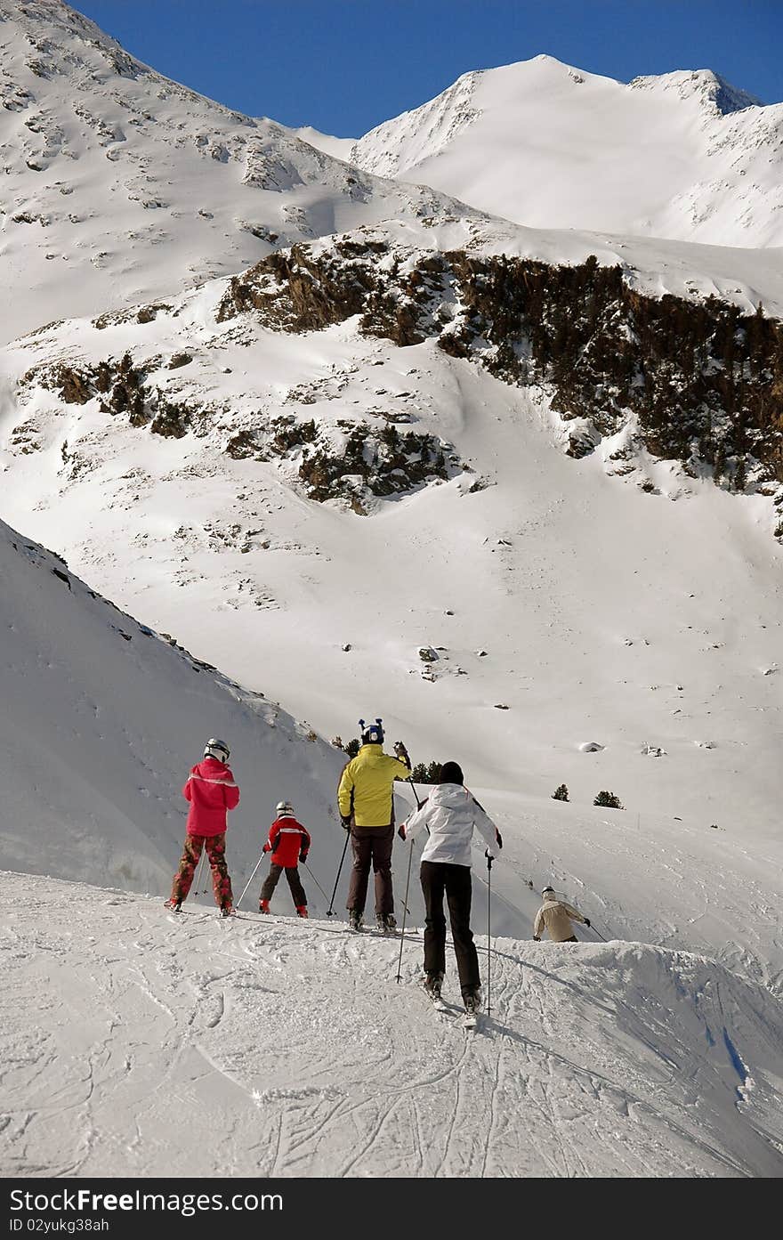 The picture of a family having fun on the top of the mountain. The picture of a family having fun on the top of the mountain