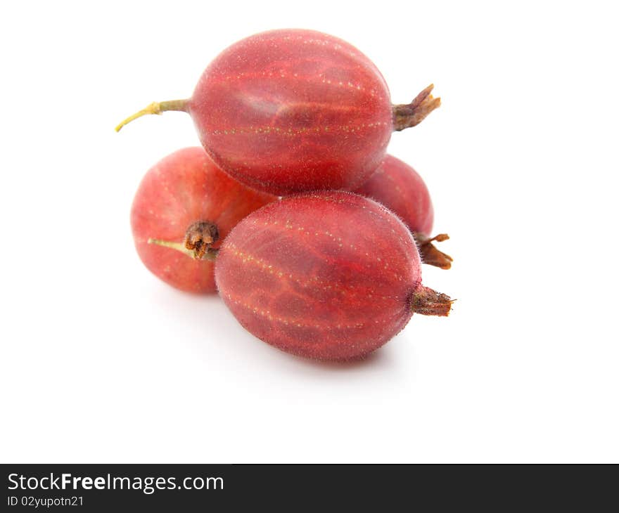 Red gooseberries on a white background.