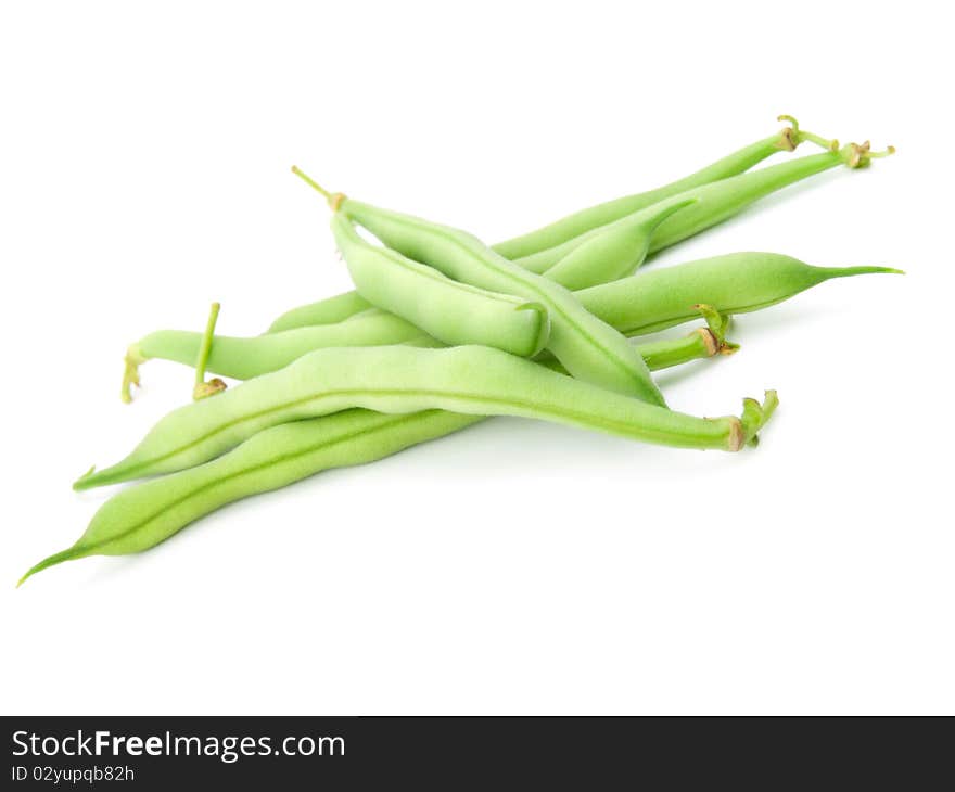 Fresh green peas on a white background