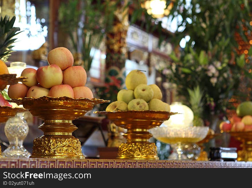 Items offered at an altar to the god or Buddha. Items offered at an altar to the god or Buddha