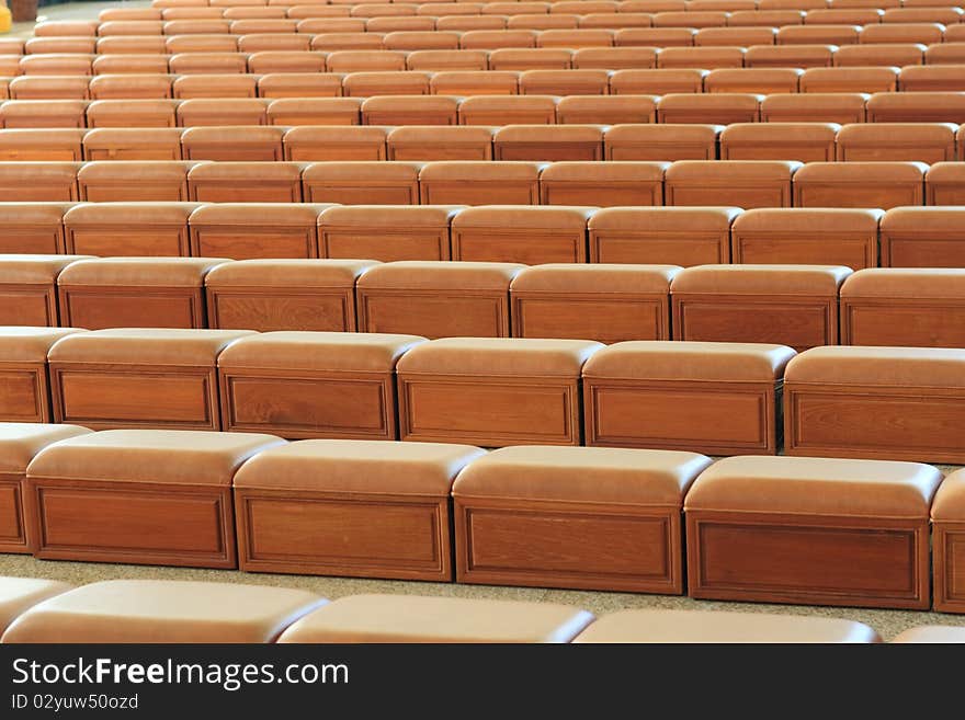 Inside the modern Buddhist temple in hong kong, seats for kneel