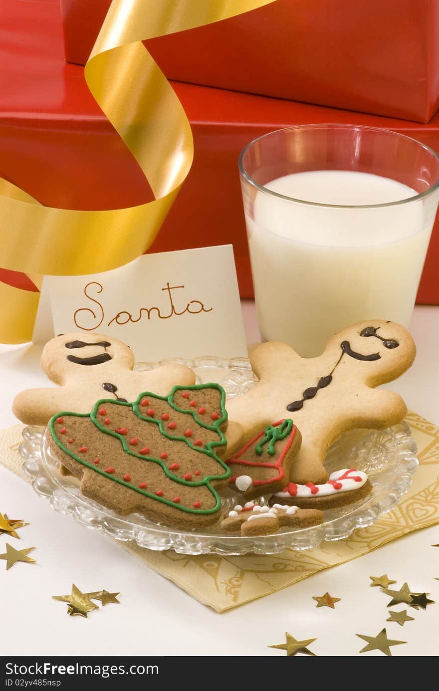 Traditional Christmas cookies and a glass of milk for Santa. Traditional Christmas cookies and a glass of milk for Santa