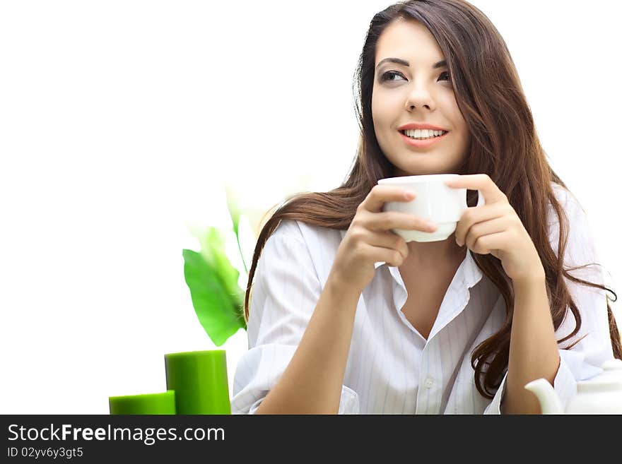 Beautiful woman in cafe over white background with flowers. Beautiful woman in cafe over white background with flowers