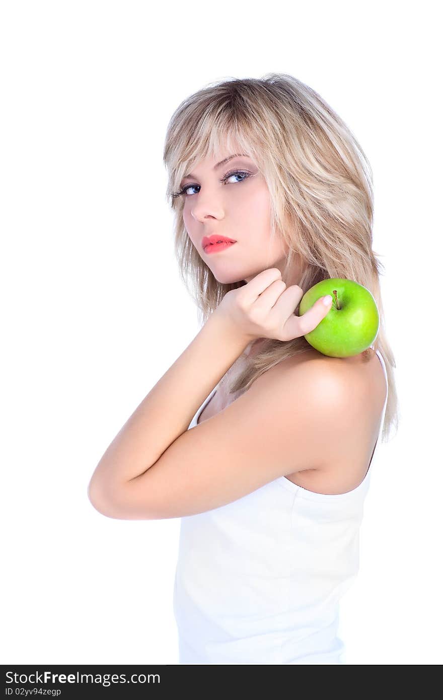 Young girl over white background with apple. Young girl over white background with apple